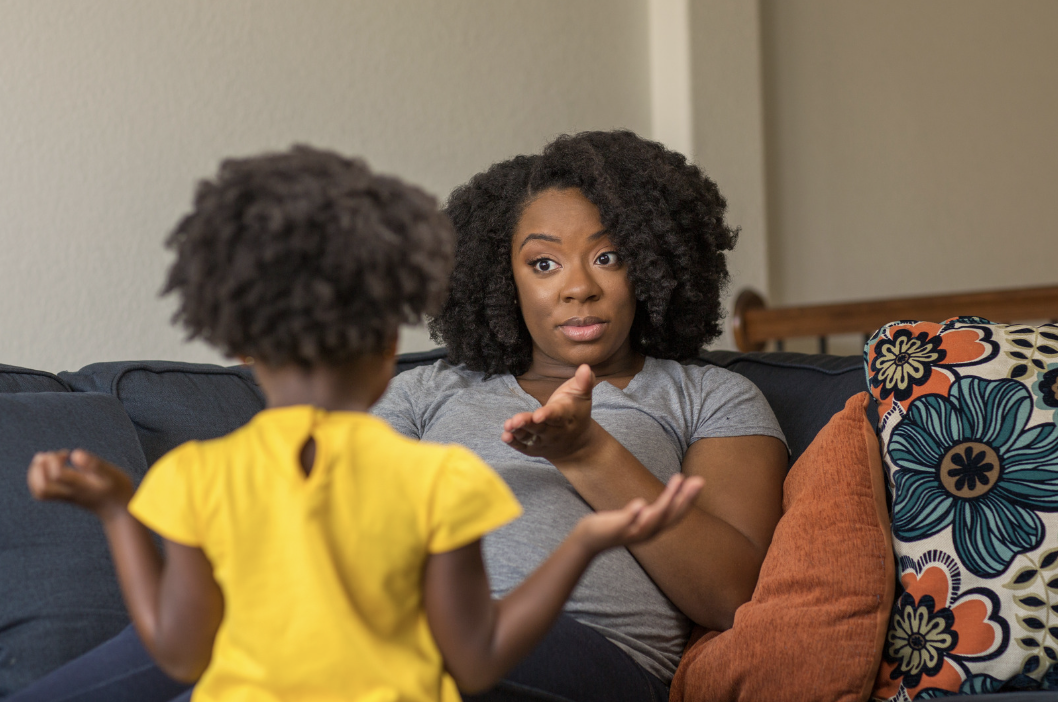 mother speaking to young child